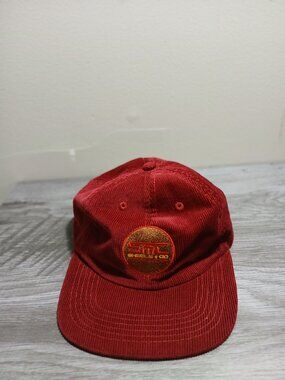 SML wheels  and company.   Burgandy Corduroy  cap. One size fits all   strap in